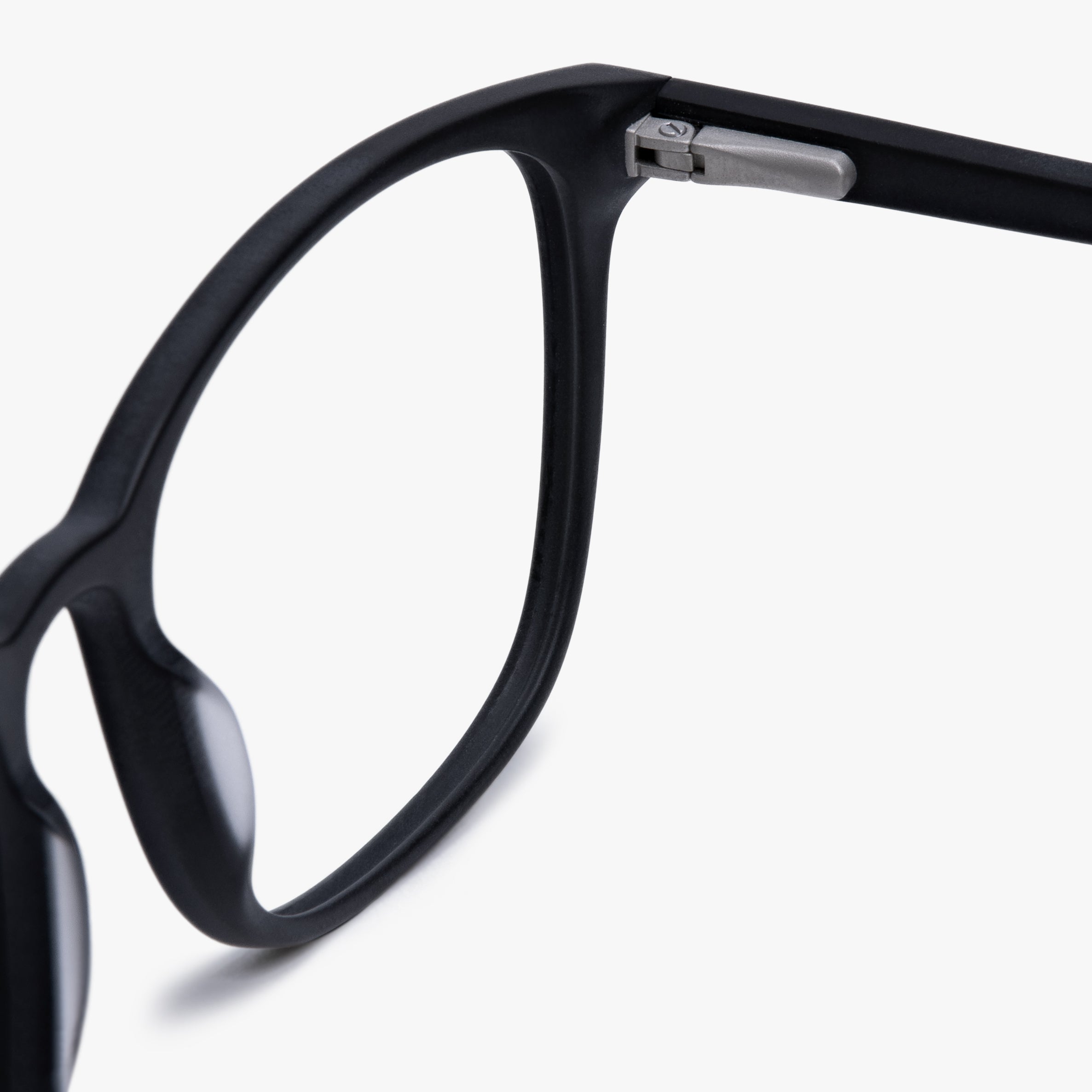 Close-up of Ebeltoft Black glasses with a matte black finish and subtle metal hinge