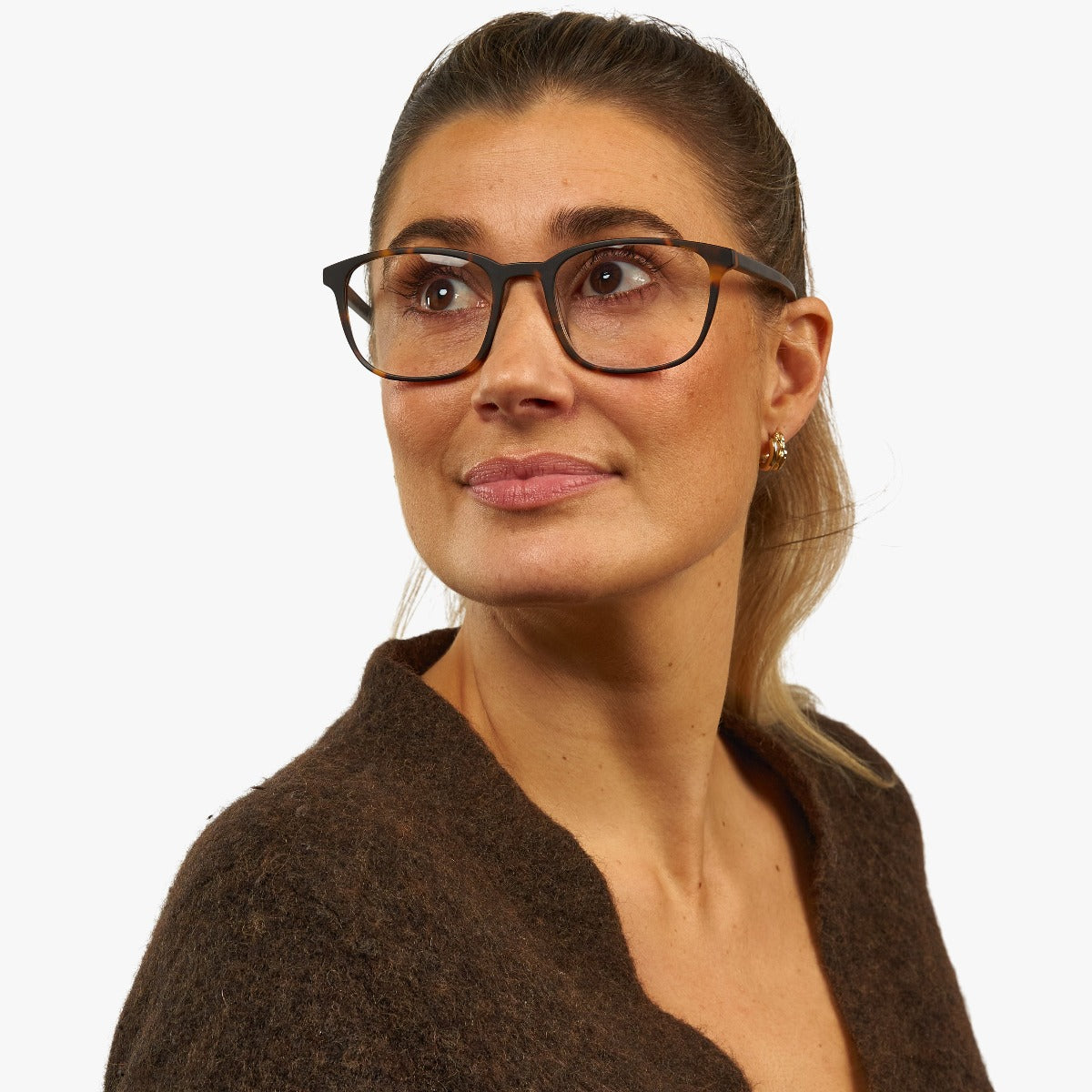 Person wearing Ebeltoft Dark Turtle glasses