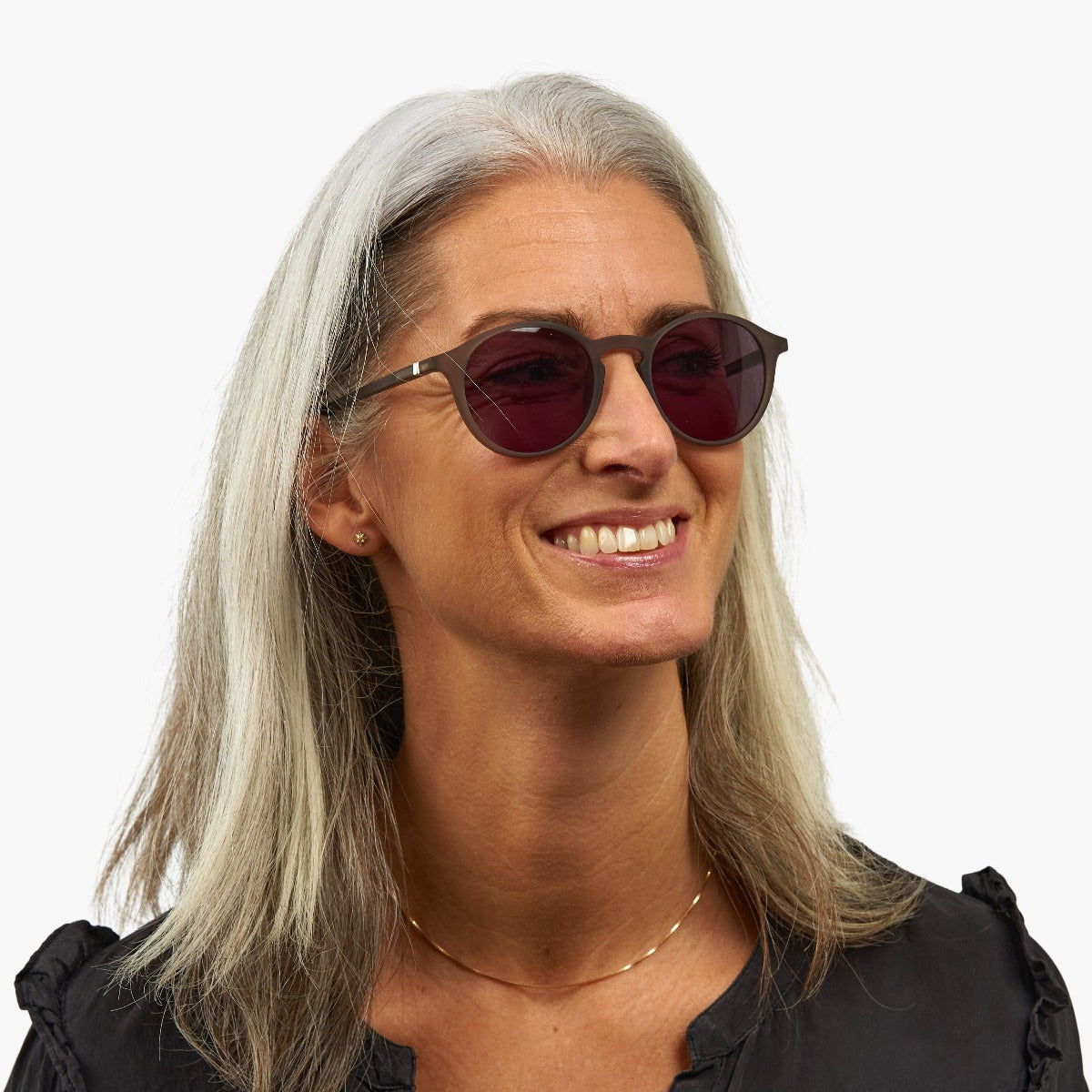 Person wearing Læsø Grey sunglasses