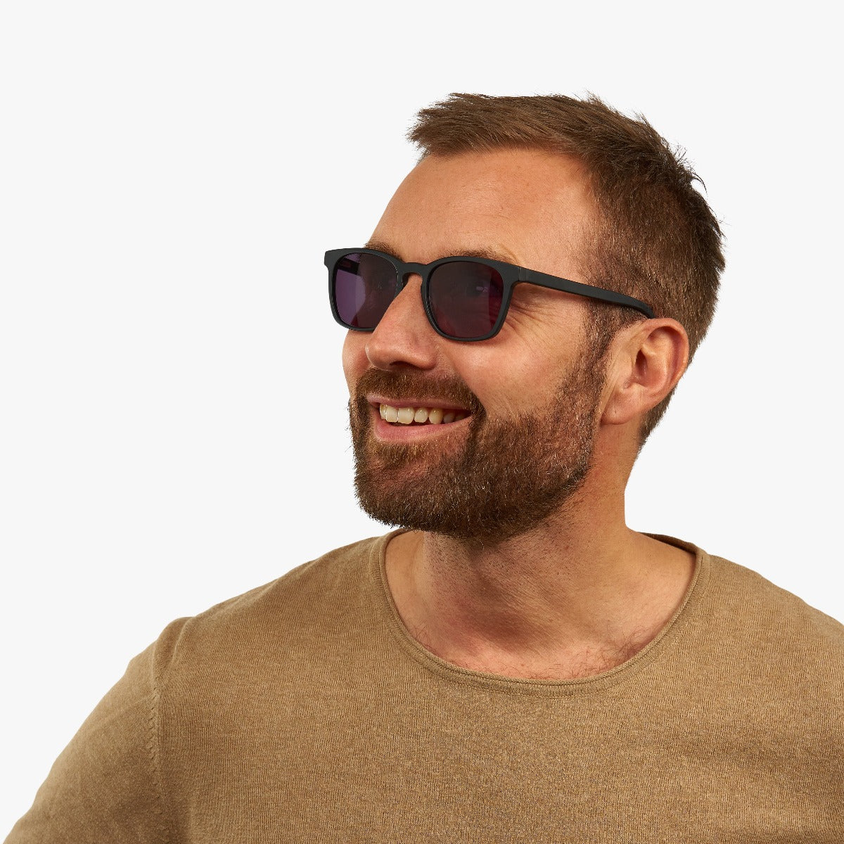 Person wearing Men's Bornholm Black sunglasses