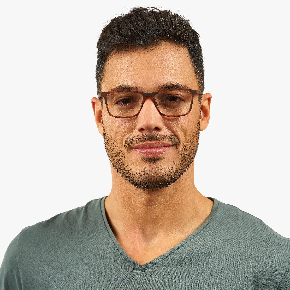 Person wearing brown turtle reading glasses