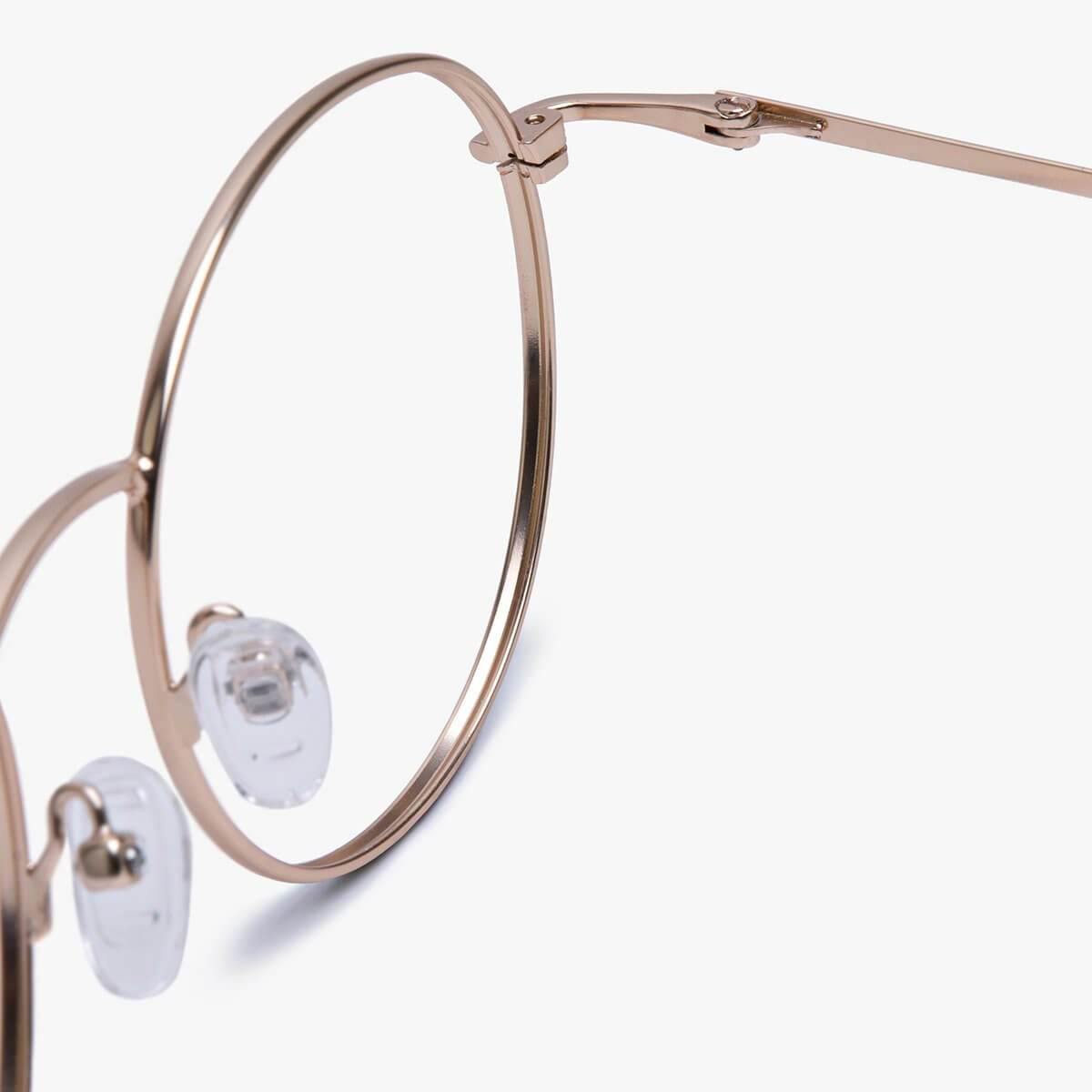 Round gold reading glasses with clear nose pads