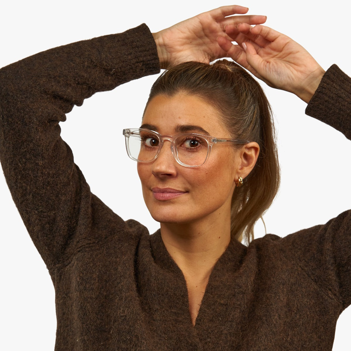 Person wearing Women's Bornholm Crystal White glasses