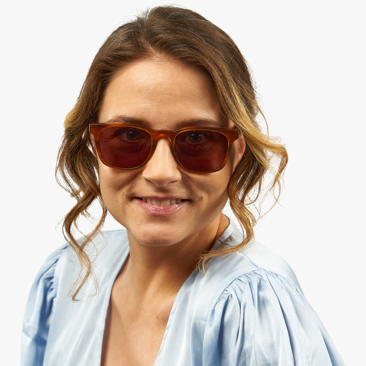womens-bornholm-shiny-walnut_sunglasses_female-model-1.jpg?v=1771420646&width=1200