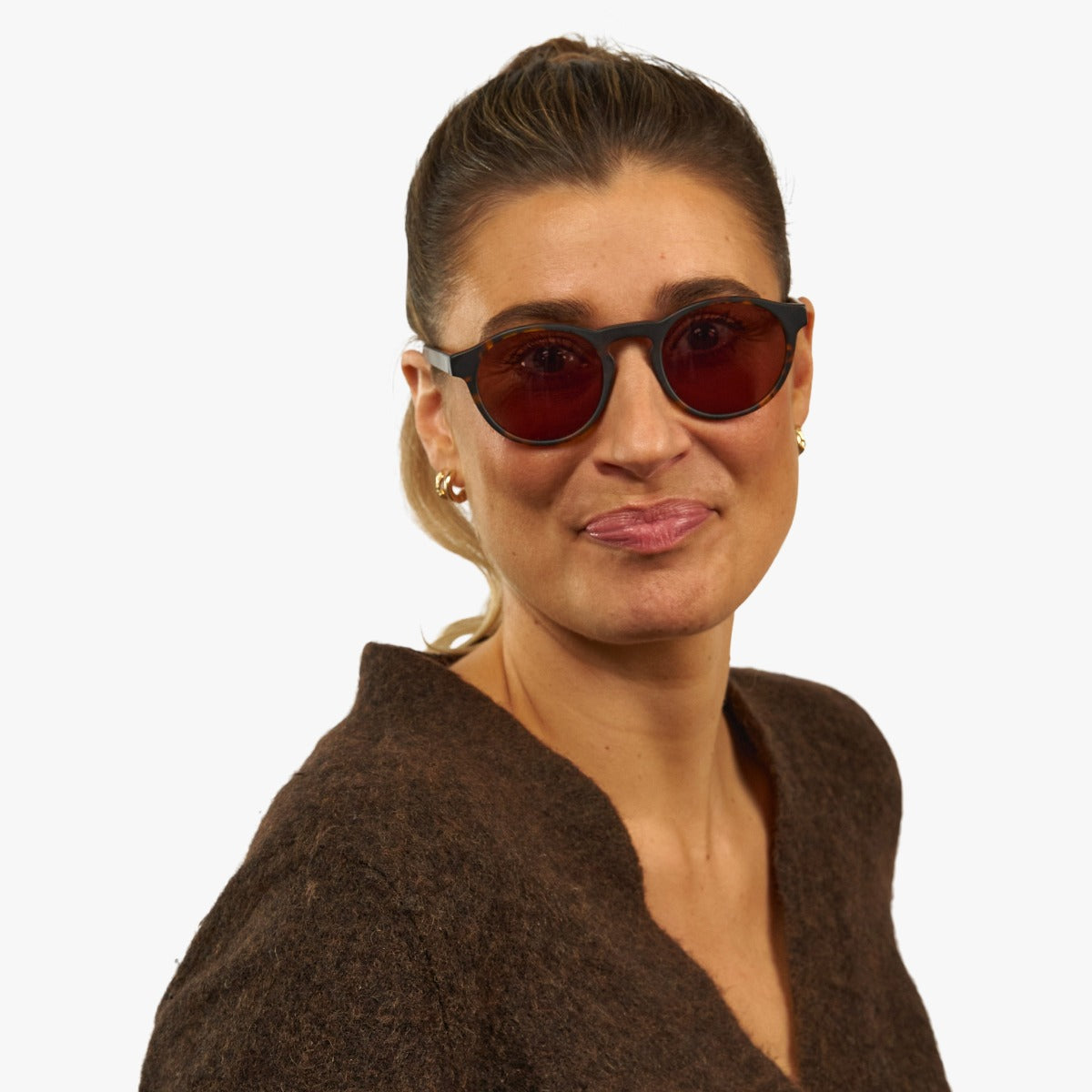 Person wearing Women's Trondheim Dark Turtle glasses